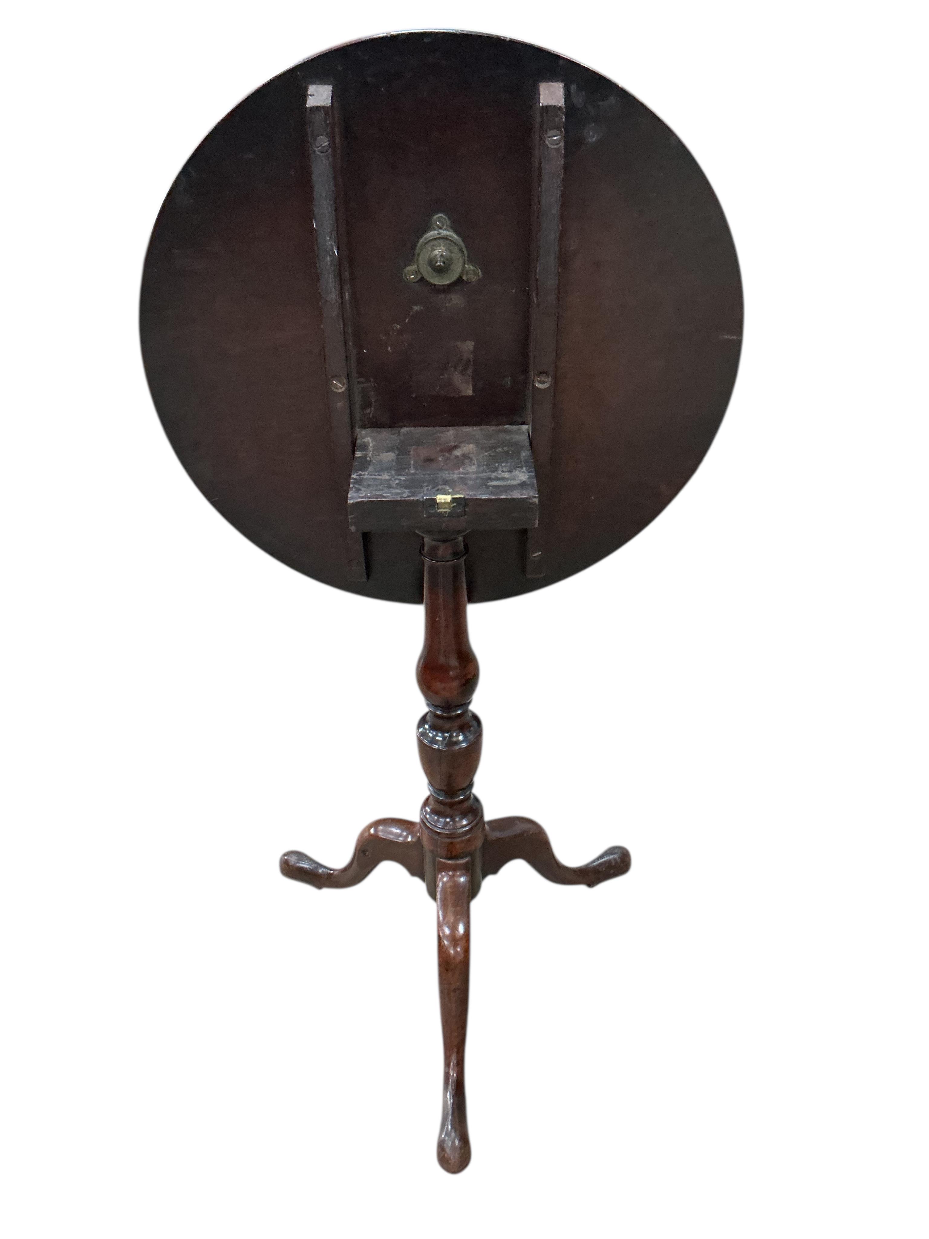 A George III mahogany circular tilt top birdcage tea table, diameter 70cm, height 72cm together with a similar smaller wine table